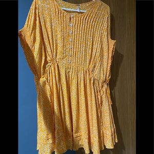 Small short sleeve/sleeveless type dress. Mini length.